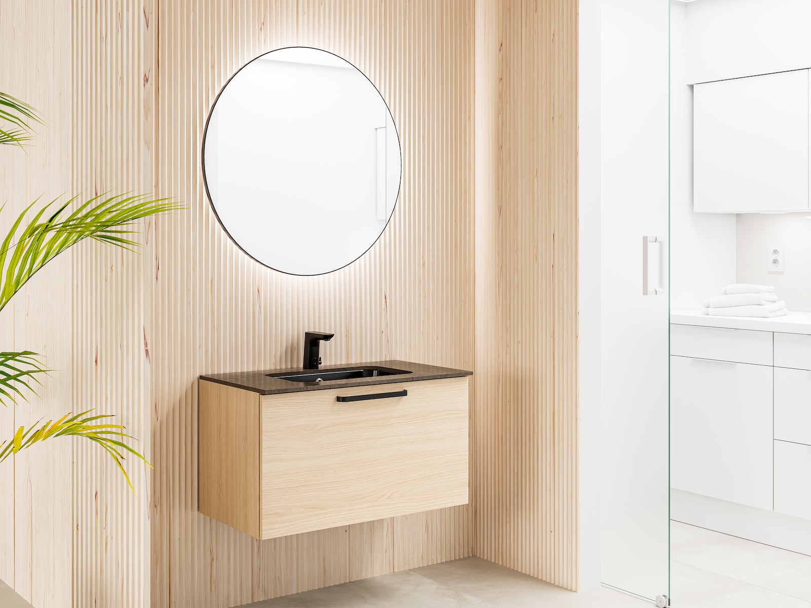 Temal kylpyhuone, Design, musta allas, musta hana, pyöreä peili, tamminen allaskaappi, vaalea kylpyhuone